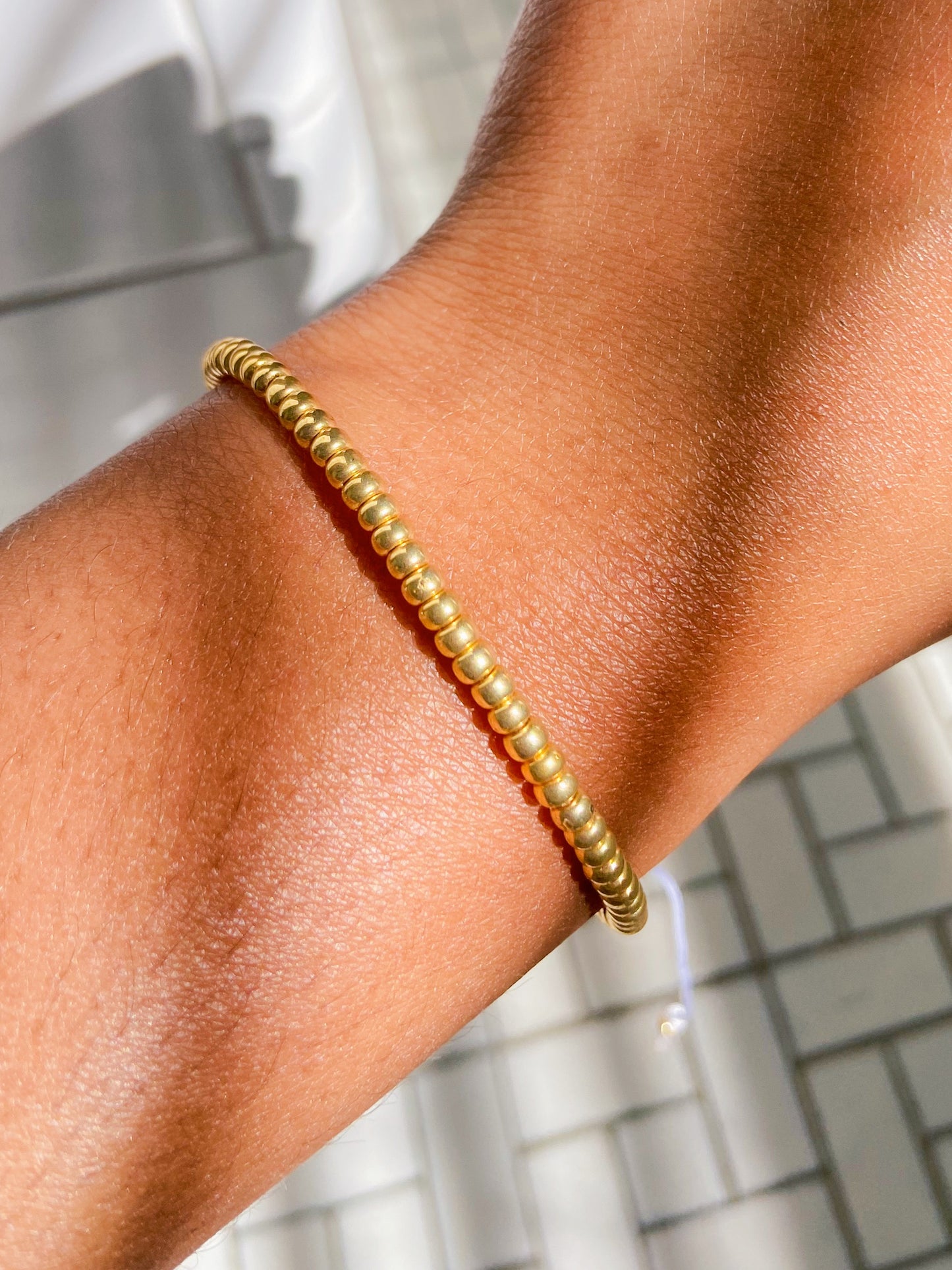 gold beaded bracelet