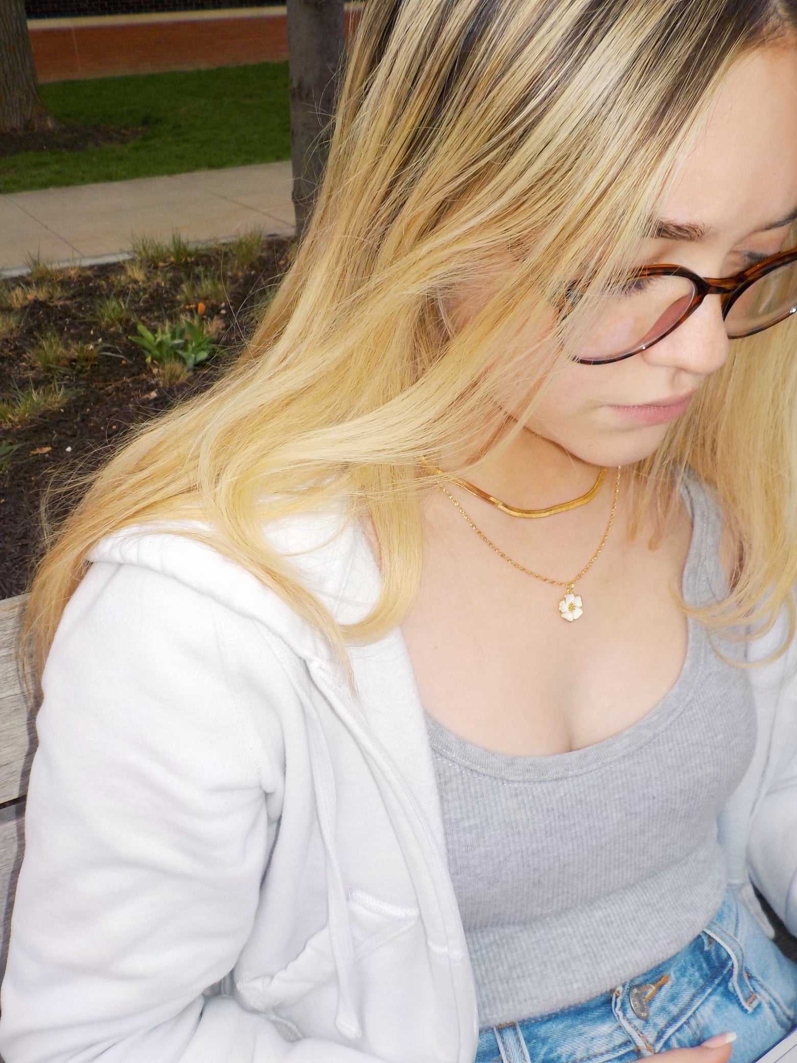 blonde girl wearing unique 18k gold plated necklaced