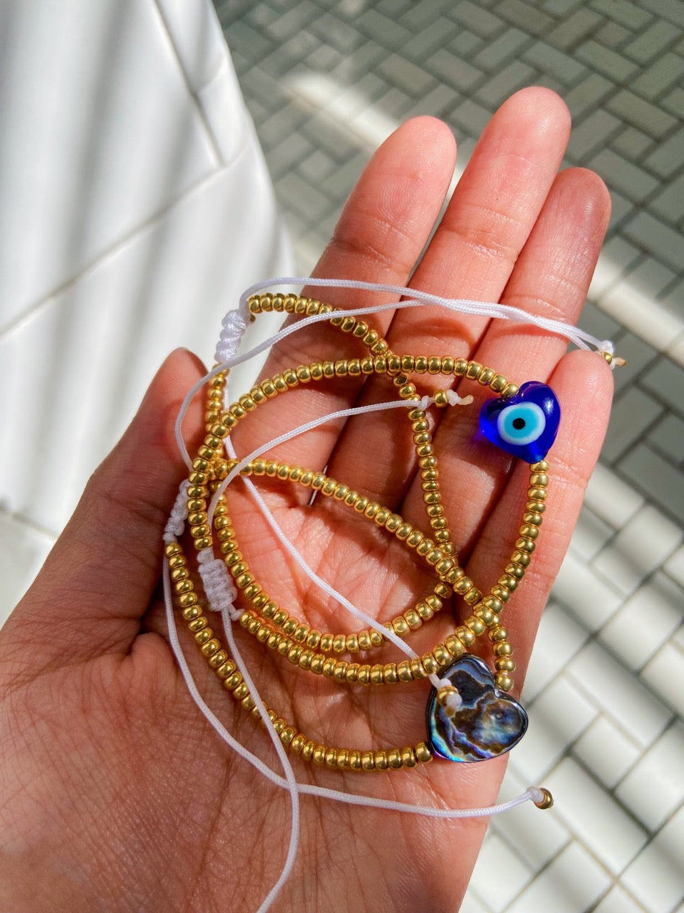 gold beaded bracelet stack